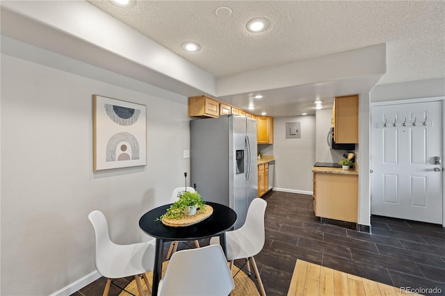 13404 E Jewell Ave Unit 101, Aurora, CO 80012 - dining room with a textured ceiling, dark wood-type flooring, and recessed lighting