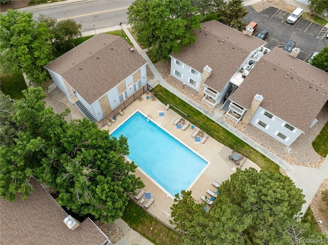 13404 E Jewell Ave Unit 101, Aurora, CO 80012 - aerial view of property and surrounding area featuring a pool area