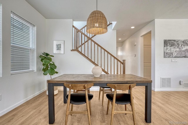 17396 Hop Clover Ave, Parker, CO 80134 - dining space with stairs and light wood-style flooring