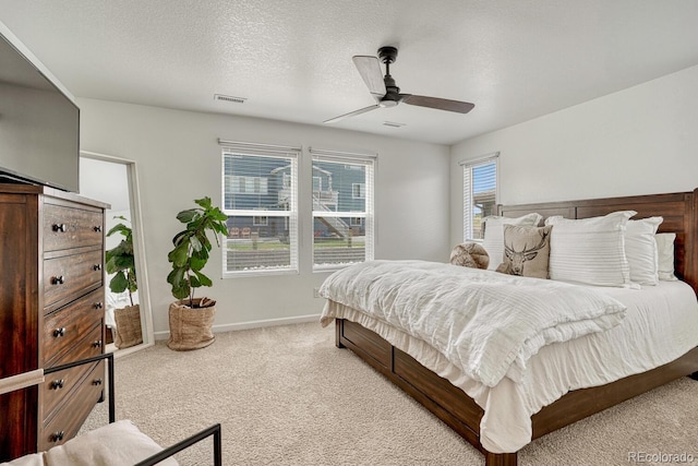 17396 Hop Clover Ave, Parker, CO 80134 - carpeted bedroom with ceiling fan and a textured ceiling