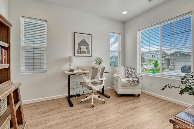 17396 Hop Clover Ave, Parker, CO 80134 - office space featuring wood finished floors and recessed lighting