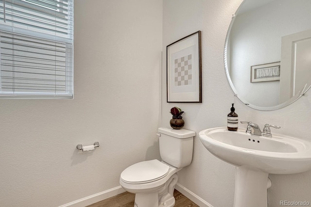 17396 Hop Clover Ave, Parker, CO 80134 - bathroom featuring wood finished floors and toilet