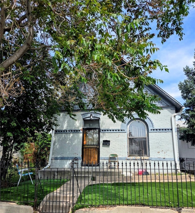 4316 Josephine St, Denver, CO 80216 - view of front of property featuring brick siding and a gate