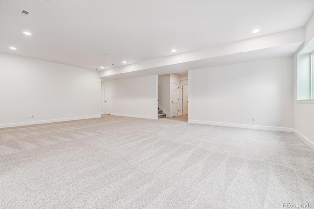 basement with light carpet