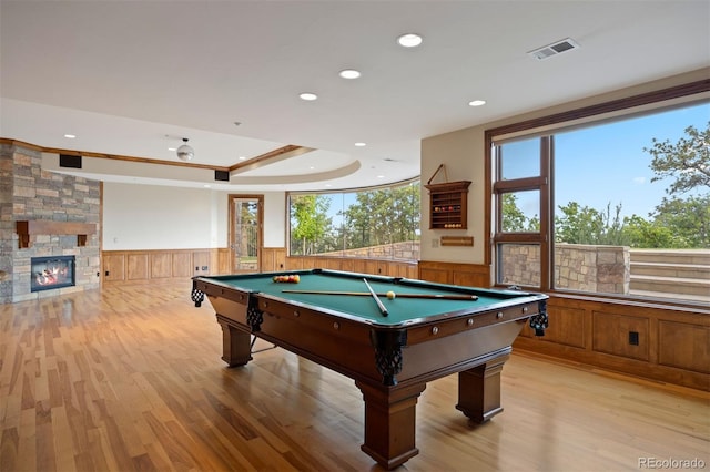 606 Cliffgate Ln, Castle Rock, CO 80108 - playroom with wainscoting, light wood-type flooring, billiards, recessed lighting, and a fireplace