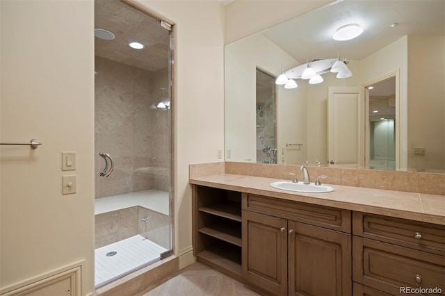 606 Cliffgate Ln, Castle Rock, CO 80108 - full bath featuring a shower stall, vanity, and tile patterned flooring