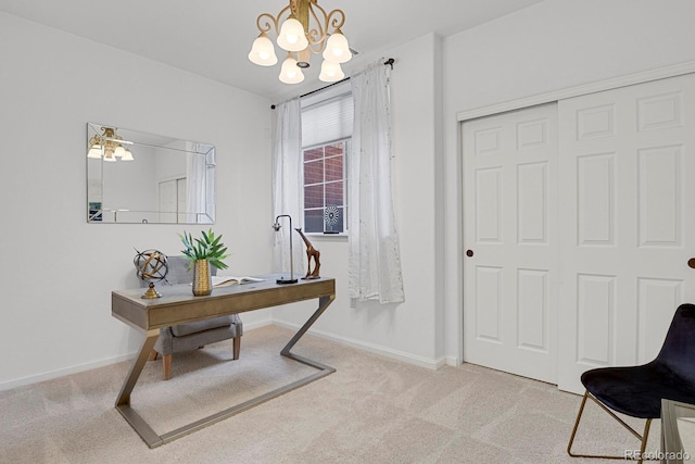 carpeted home office with baseboards and an inviting chandelier