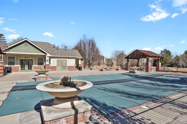 view of pool with a fenced in pool, french doors, a gazebo, a patio area, and fence