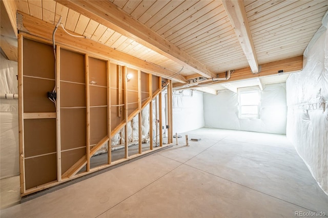 basement featuring wooden ceiling