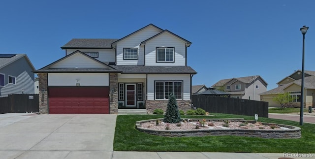 9455 Shinnecock Ct, Peyton, CO 80831 - view of front of house featuring driveway, a garage, stone siding, and roof with shingles