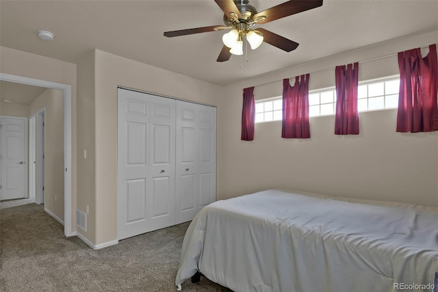 9455 Shinnecock Ct, Peyton, CO 80831 - carpeted bedroom featuring a closet, a ceiling fan, and baseboards