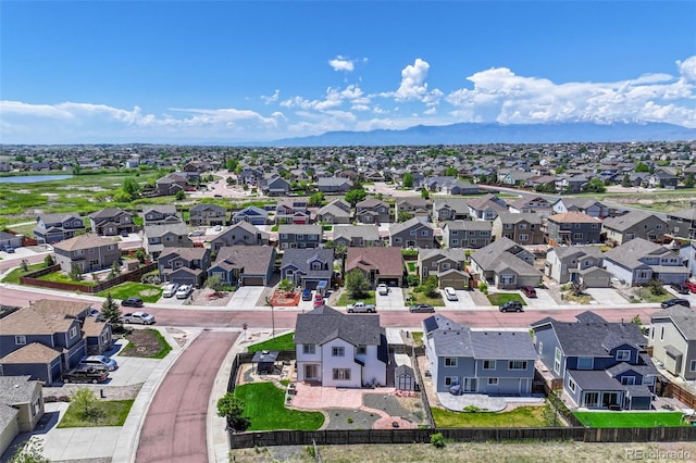 9455 Shinnecock Ct, Peyton, CO 80831 - aerial perspective of suburban area with mountains