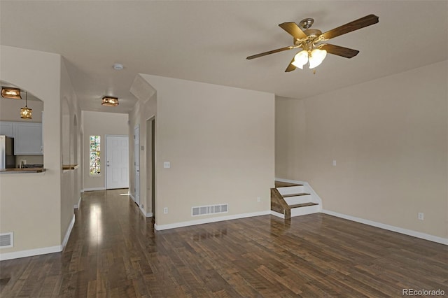 9455 Shinnecock Ct, Peyton, CO 80831 - empty room featuring dark wood finished floors, a ceiling fan, and baseboards