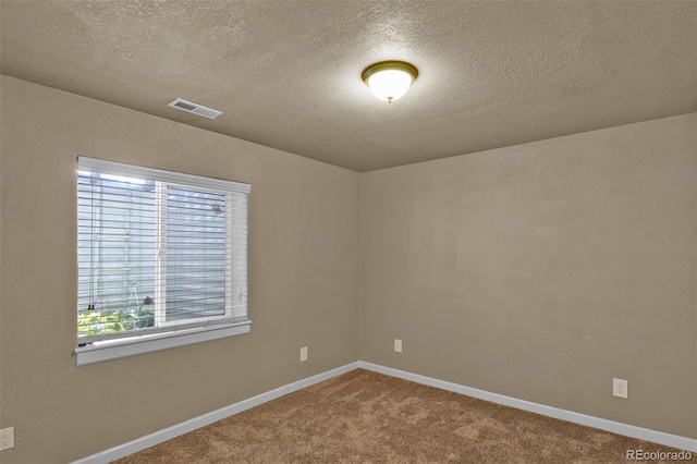 9455 Shinnecock Ct, Peyton, CO 80831 - unfurnished room with a textured ceiling, carpet, and baseboards