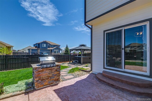 9455 Shinnecock Ct, Peyton, CO 80831 - fenced backyard with a patio, a gazebo, and a residential view