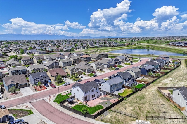 9455 Shinnecock Ct, Peyton, CO 80831 - aerial view of residential area with a nearby body of water