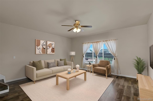 9455 Shinnecock Ct, Peyton, CO 80831 - living room featuring a ceiling fan, dark wood finished floors, and baseboards