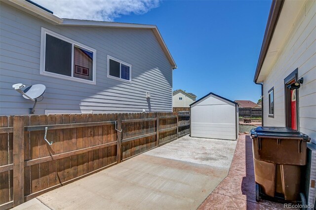 9455 Shinnecock Ct, Peyton, CO 80831 - fenced backyard with a patio