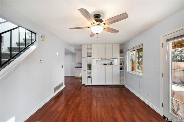 kitchen with white cabinetry, dark hardwood / wood-style floors, and ceiling fan