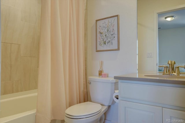 full bathroom featuring vanity, shower / bath combo, and toilet