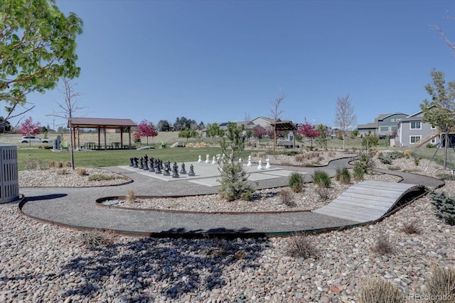 view of home's community with a gazebo and a lawn