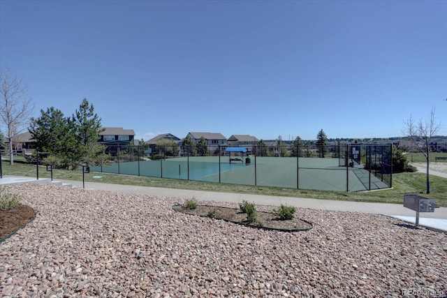 view of basketball court featuring tennis court