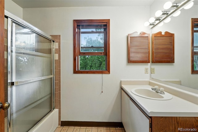 2960 Shadow Creek Dr Unit 201, Boulder, CO 80303 - bathroom featuring vanity and combined bath / shower with glass door