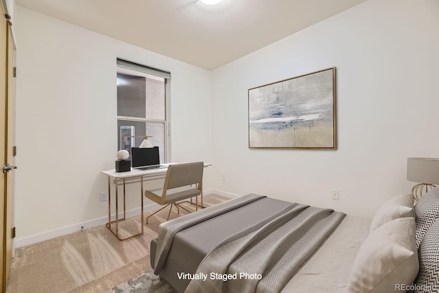 bedroom featuring carpet floors, a desk, and baseboards