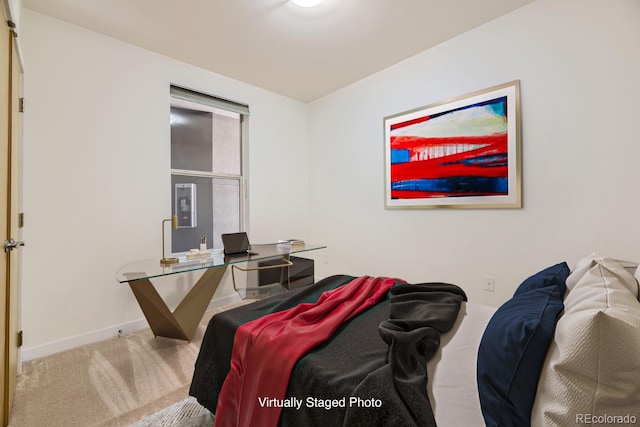 1313 S Clarkson St Unit 205, Denver, CO 80210 - carpeted bedroom featuring baseboards and an office area