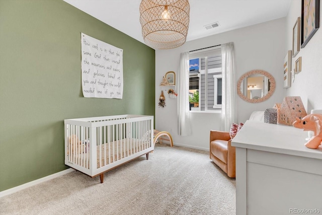 722 Eva Peak Dr, Erie, CO 80516 - bedroom with carpet flooring, a crib, and baseboards