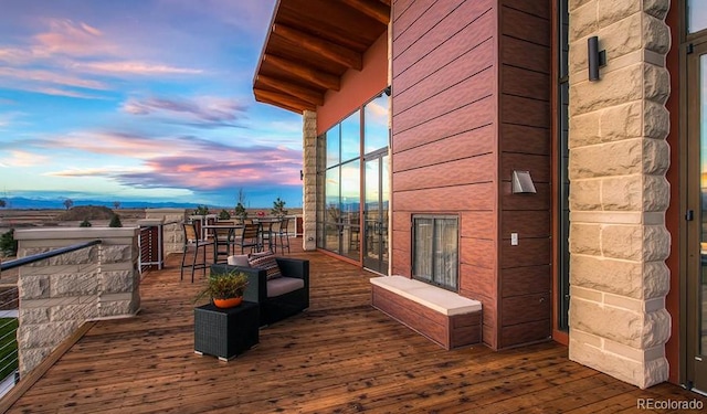 722 Eva Peak Dr, Erie, CO 80516 - view of deck at dusk