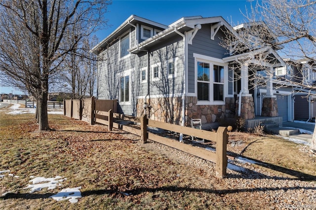 view of property exterior featuring a garage