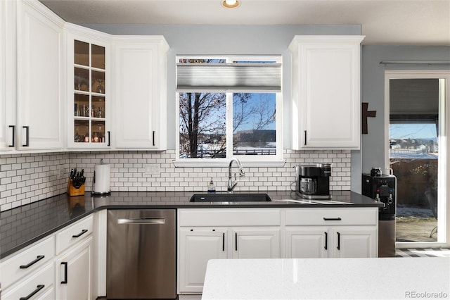 kitchen with sink and white cabinetry