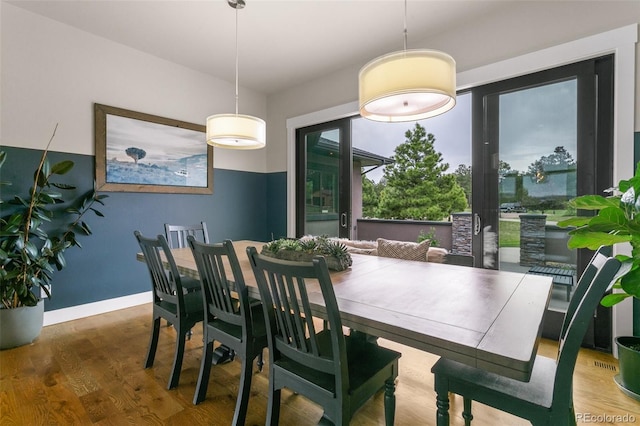 843 Long Timber Ln, Monument, CO 80132 - dining area with wood finished floors and baseboards