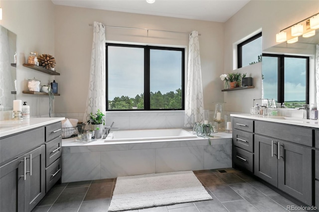 843 Long Timber Ln, Monument, CO 80132 - full bath featuring vanity, a garden tub, and tile patterned floors