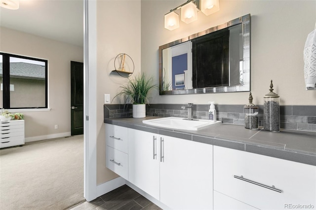 843 Long Timber Ln, Monument, CO 80132 - bathroom with vanity and baseboards