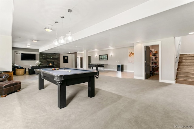 843 Long Timber Ln, Monument, CO 80132 - playroom featuring carpet flooring, billiards, and a warm lit fireplace