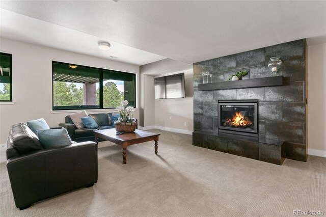 843 Long Timber Ln, Monument, CO 80132 - living area featuring carpet floors and a fireplace