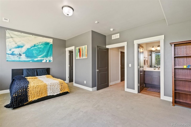 843 Long Timber Ln, Monument, CO 80132 - bedroom with light colored carpet and ensuite bath