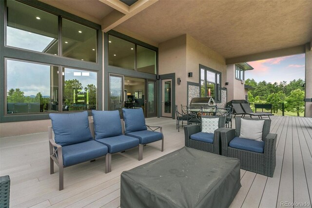 843 Long Timber Ln, Monument, CO 80132 - wooden deck with an outdoor hangout area