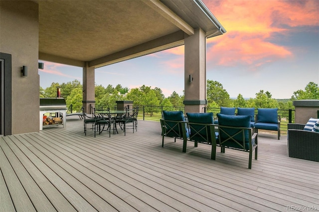 843 Long Timber Ln, Monument, CO 80132 - wooden deck with outdoor lounge area, outdoor dining area, and a grill