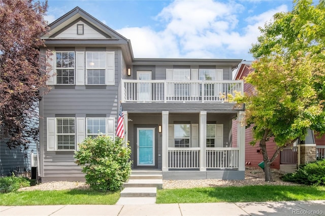 186 S 45th Ave, Brighton, CO 80601 - multi unit property with a balcony and covered porch