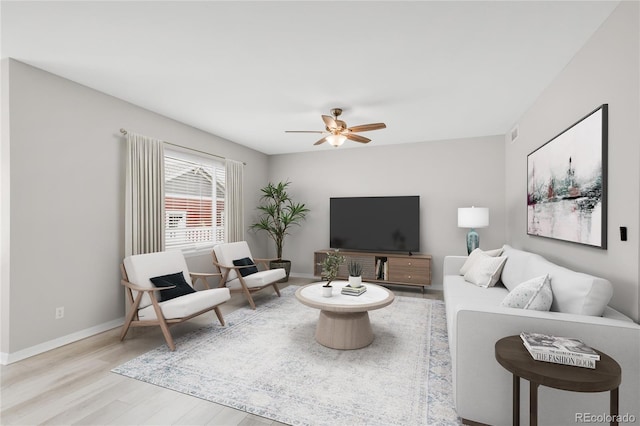 186 S 45th Ave, Brighton, CO 80601 - living area featuring ceiling fan and wood finished floors