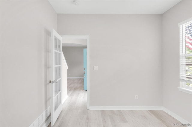 186 S 45th Ave, Brighton, CO 80601 - spare room featuring light wood finished floors and french doors