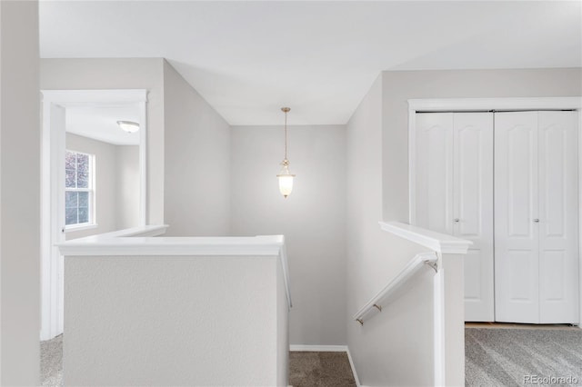 186 S 45th Ave, Brighton, CO 80601 - corridor featuring an upstairs landing and carpet floors