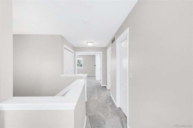 186 S 45th Ave, Brighton, CO 80601 - corridor featuring light colored carpet and baseboards