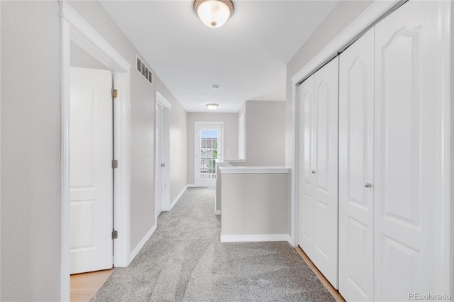 186 S 45th Ave, Brighton, CO 80601 - hallway with baseboards and light carpet