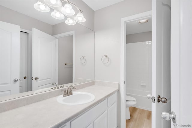 186 S 45th Ave, Brighton, CO 80601 - bathroom with vanity, wood finished floors, and  shower combination