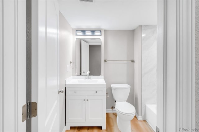 186 S 45th Ave, Brighton, CO 80601 - bathroom featuring vanity and wood finished floors
