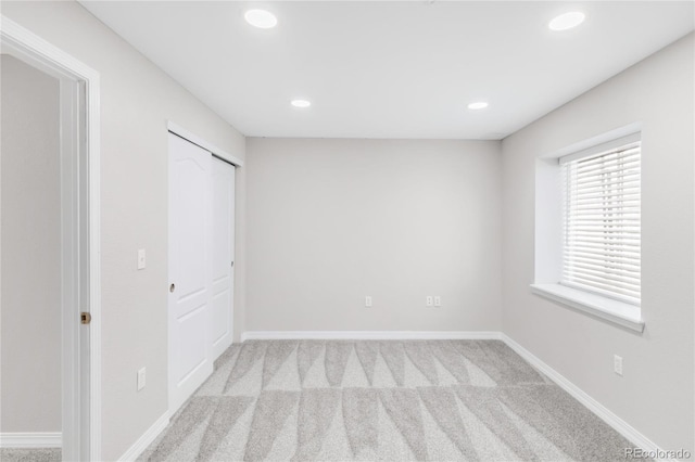 186 S 45th Ave, Brighton, CO 80601 - unfurnished bedroom with recessed lighting, carpet flooring, and a closet